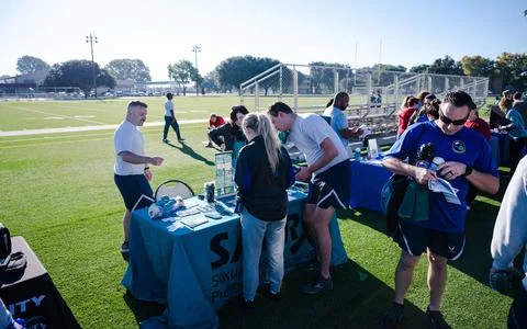 RECORD DATE NOT STATED Airmen attending the Laps for Life event interact w... Stock Photos