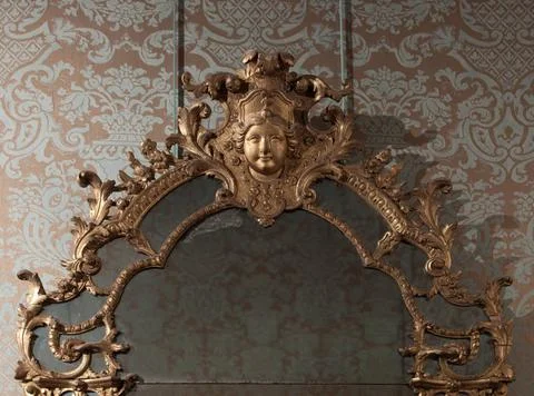 RECORD DATE NOT STATED  Anonymous. Mirror. Sculpted and gilded wood on a b... Stock Photos