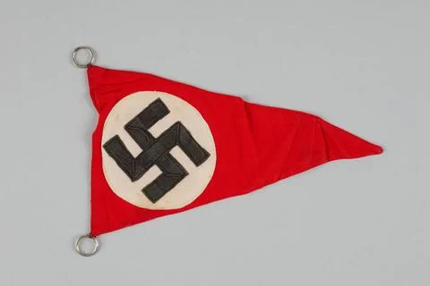 RECORD DATE NOT STATED  Anonymous, a small triangular flag with a swastika... Stock Photos