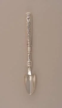 RECORD DATE NOT STATED Assyrian Head pattern Cheese Scoop; Designed by Rog... Foto stock