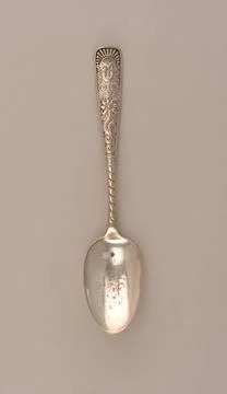 RECORD DATE NOT STATED Assyrian Head pattern Spoon; Manufactured by Meride... Stock Photos