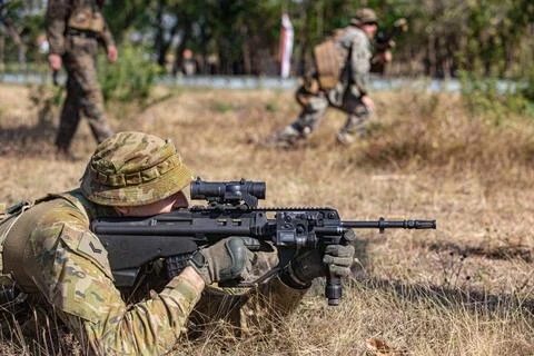 RECORD DATE NOT STATED  An Australian Solider and a U.S. Marine, conducts ... Stock Photos