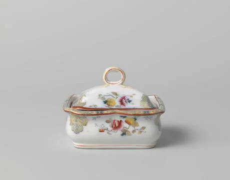 RECORD DATE NOT STATED  Bake with lid and colander with multicolored flowe... Stock Photos