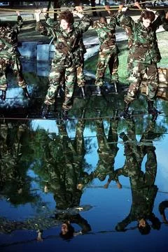 RECORD DATE NOT STATED Basic training personnel cross over water on parall... Stock Photos