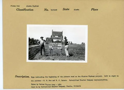 RECORD DATE NOT STATED Building Alaska Highway. Original caption: Sign ind... Fotos de archivo