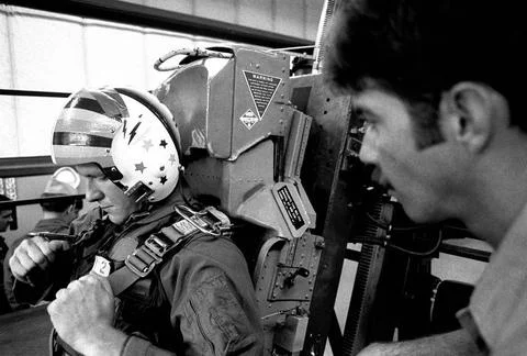 RECORD DATE NOT STATED A candidate straps himself into an ejection seat tr... Stock Photos