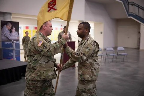 RECORD DATE NOT STATED Capt. Michael Roach Jr., right, assumes command of ... Stock Photos