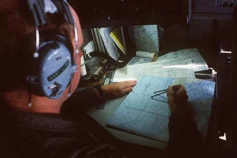 RECORD DATE NOT STATED CAPT. Donald E. Link, navigator, plots the course f... 스톡 사진