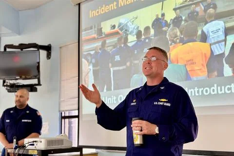 RECORD DATE NOT STATED  Capt. Nicholas Simmons welcomes participants from ... Stock Photos