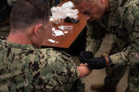 RECORD DATE NOT STATED  Chief Hospital Corpsman Victor Suanier right, Nava... Stock Photos