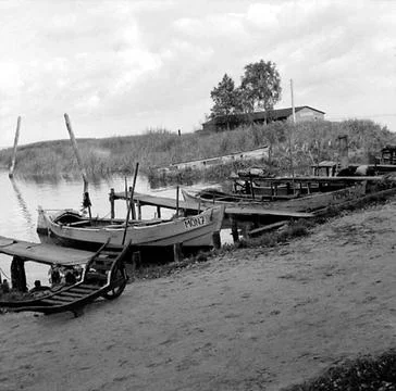 RECORD DATE NOT STATED A couple of boats are located on some jetties in a ... Fotos Stock