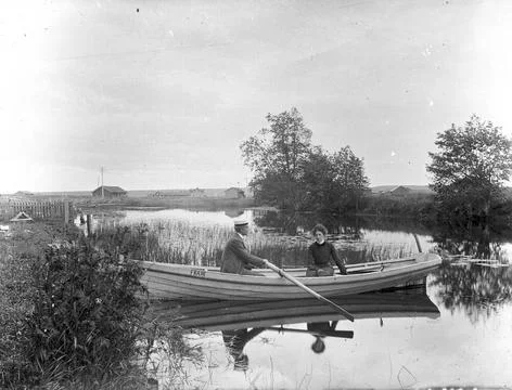 RECORD DATE NOT STATED Couple in boat in Hamrange. Par i bat i Hamrange. C... Stock Photos