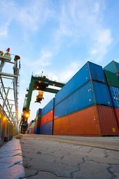 RECORD DATE NOT STATED Cranes and multi-colored stack of cargo containers ... Foto stock