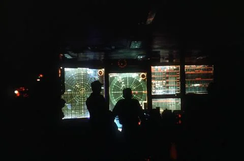 RECORD DATE NOT STATED Crewmen study plotting boards in a shipboard combat... Foto stock