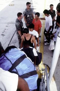 RECORD DATE NOT STATED Cuban immigrants board a plane for their parole fli... Stock Photos