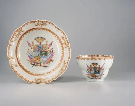 RECORD DATE NOT STATED  Cup with handle with a coat of arms, flower sprays... Photos