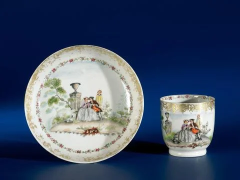 RECORD DATE NOT STATED  Cup with handle with an European couple sitting in... Photos