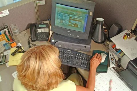 RECORD DATE NOT STATED Data Entry and Information Process Worker Copyright... Stock Photos