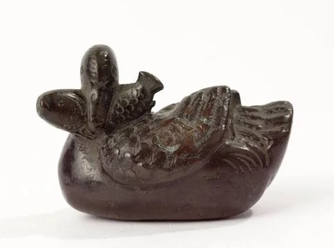 RECORD DATE NOT STATED  Duck holding a fish. Bronze. Japan. Paris, Cernusc... Stock Photos