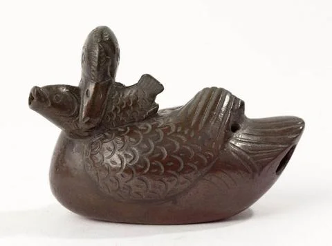 RECORD DATE NOT STATED  Duck holding a fish. Bronze. Japan. Paris, Cernusc... Stock Photos