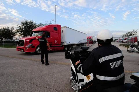 RECORD DATE NOT STATED Early Morning Rollout of Commodity Filled Trucks in... Stock Photos