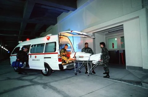 RECORD DATE NOT STATED An Emergency Medical Ambulance team off loads a cri... Stock Photos