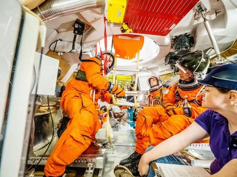 RECORD DATE NOT STATED  Engineers and astronauts conduct testing in a repr... Stock Photos
