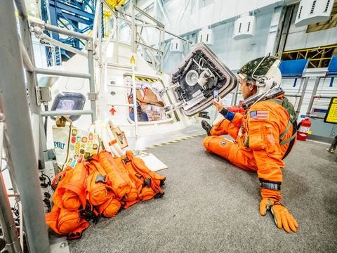 RECORD DATE NOT STATED  Engineers and astronauts conduct testing in a repr... Stock Photos