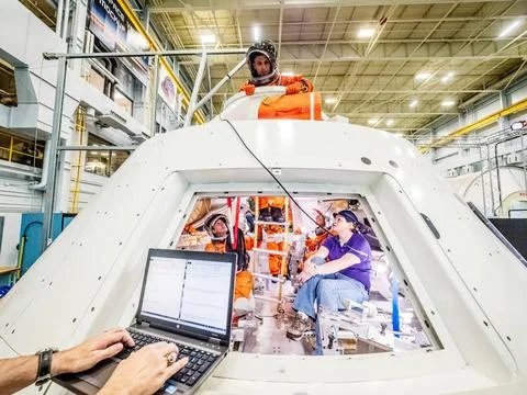 RECORD DATE NOT STATED  Engineers and astronauts conduct testing in a repr... Stock Photos