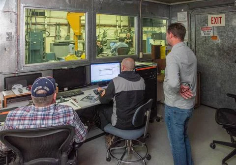 RECORD DATE NOT STATED  Engineers monitor data during vibration testing of... Foto stock