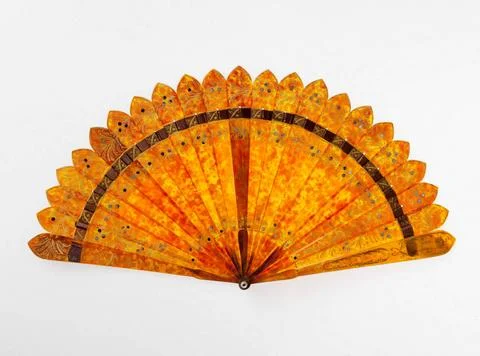 RECORD DATE NOT STATED  EVENTAIL. Golden palmette pattern and steel sequin... 스톡 사진