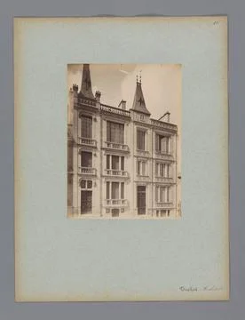 RECORD DATE NOT STATED  Facade of a building in Paris, LampuÃ et Cie, c. 1.. Fotos de archivo
