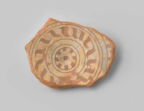 RECORD DATE NOT STATED  Fragment of red -baking earthenware with foot ring... Stock Photos