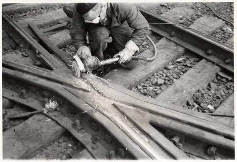 RECORD DATE NOT STATED Grinding after welding gear at Söder Mälarstrand. C. Stock Photos