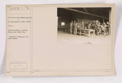 RECORD DATE NOT STATED  group of students are seen working on airplane par... Stock Photos