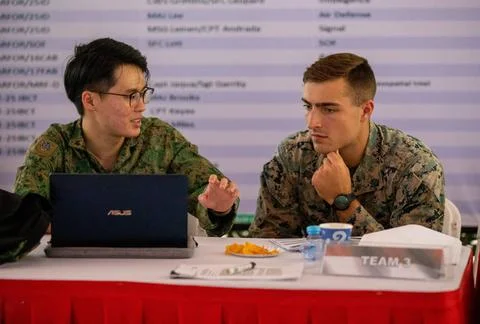 RECORD DATE NOT STATED  A group of joint multinational service members par... 스톡 사진
