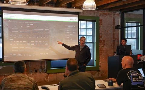 RECORD DATE NOT STATED Hack the Ranch participants present their software ... Stock Photos