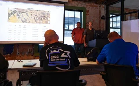 RECORD DATE NOT STATED Hack the Ranch participants present their software ... Stock Photos