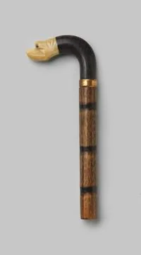 RECORD DATE NOT STATED  Handle of wood, on which a curved button of black ... Photos