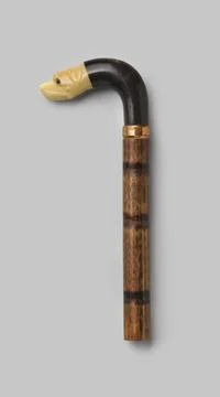 RECORD DATE NOT STATED  Handle of wood, on which a curved button of black ... Photos