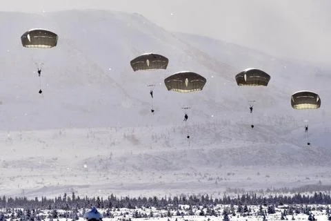 RECORD DATE NOT STATED Ice crystals fill the air as U.S. and Canadian para... 스톡 사진