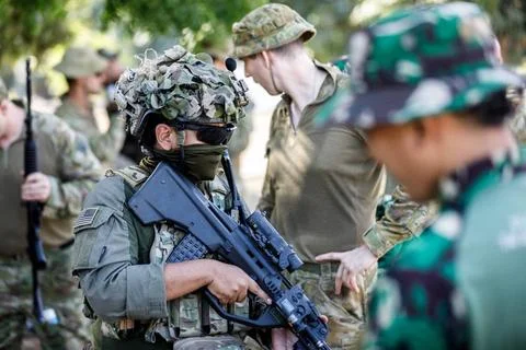 RECORD DATE NOT STATED  An Indonesian Armed Forces Interpreter dons the ge... Stock Photos
