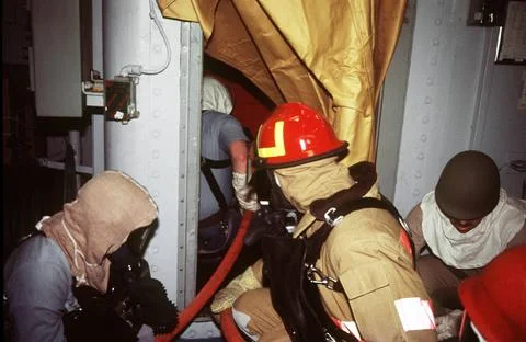 RECORD DATE NOT STATED Keeping low to minimize exposure to the heat, membe... Stock Photos