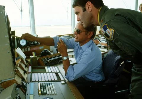 RECORD DATE NOT STATED MAJ Don McCabe, right, is briefed by a Danish air c... Stock Photos