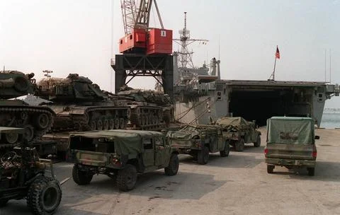 RECORD DATE NOT STATED Marines wait to load their vehicles aboard the amph... Stock Photos
