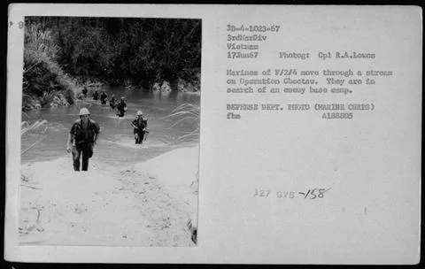 RECORD DATE NOT STATED  Marines from F/2/4 wade through a stream during Op... Foto stock