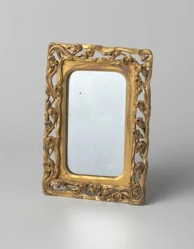 RECORD DATE NOT STATED  Mirror with mirror frame of gilded tin decorated w... Stock Photos