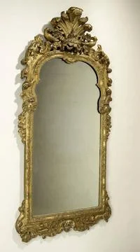 RECORD DATE NOT STATED  Mirror in frame of gilded lindenhout with a lambre... 写真素材