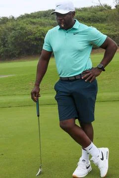 RECORD DATE NOT STATED  NFL Hall of Fame player, Marshall Faulk, plays gol... Foto stock