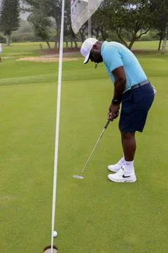 RECORD DATE NOT STATED  NFL Hall of Fame player, Marshall Faulk, plays gol... Foto stock